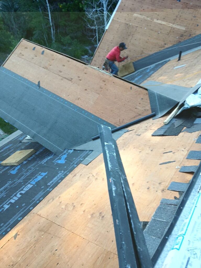 One of our best roofers in Sandy, Utah, installing a new roof. 